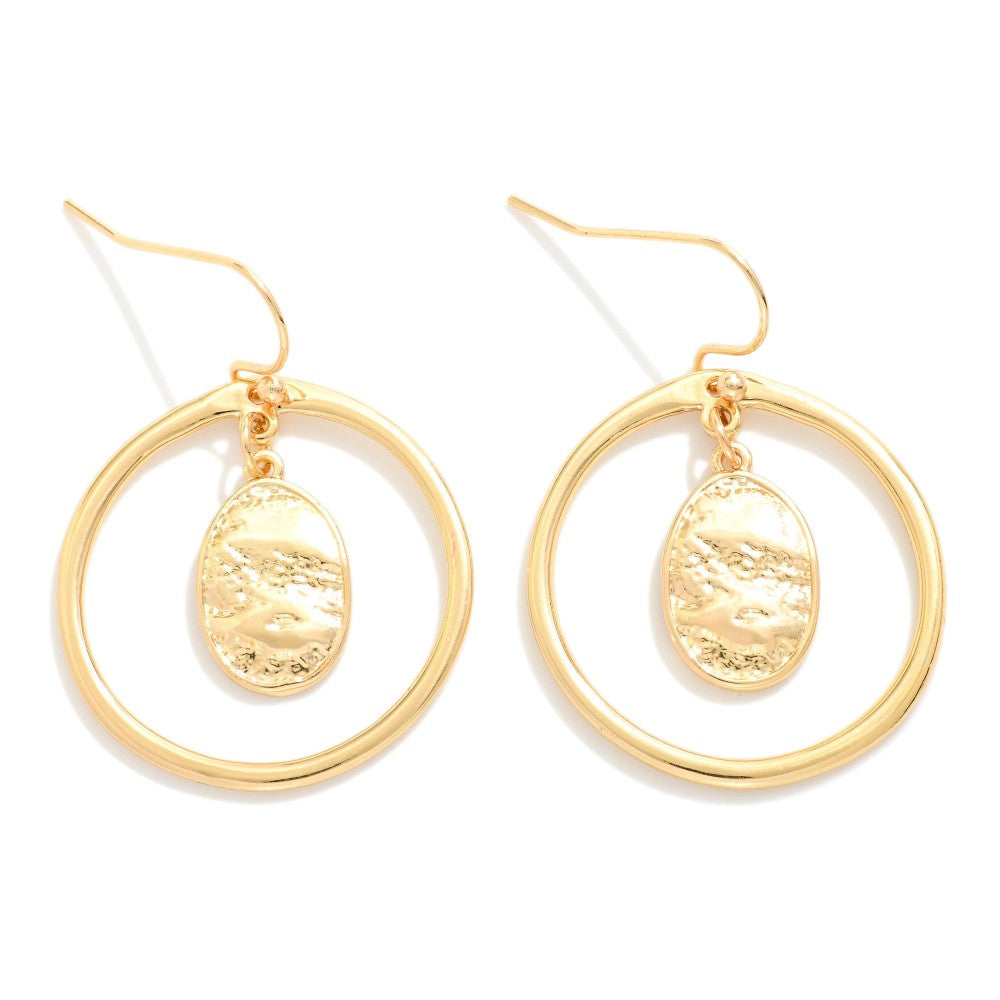 Metal Tone Hoop Drop Earrings Featuring Nesting Textured Metal Oval Detail