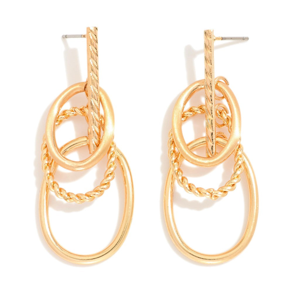 Textured Metal Tone Overlapping Hoops Hanging From A Vertical Bar Stud