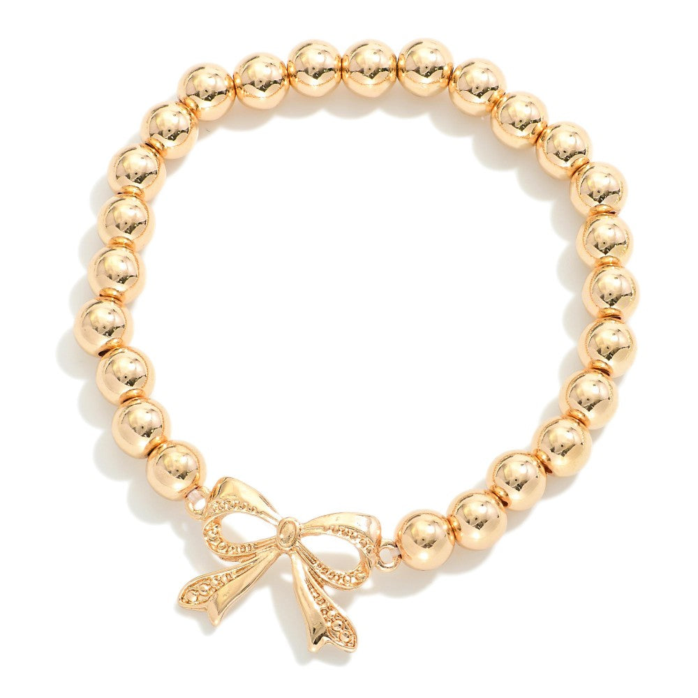 Metal Tone Beaded Stretch Bracelets With Bow Charm