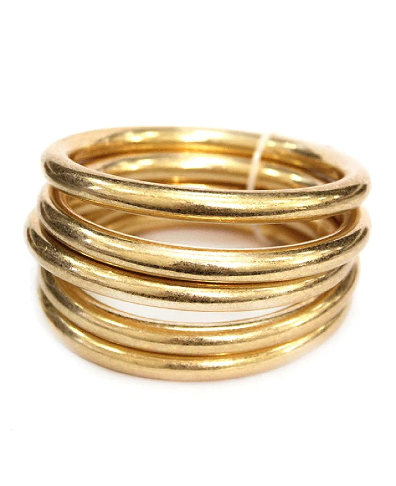 BANGLE BRACELETS WORN GOLD