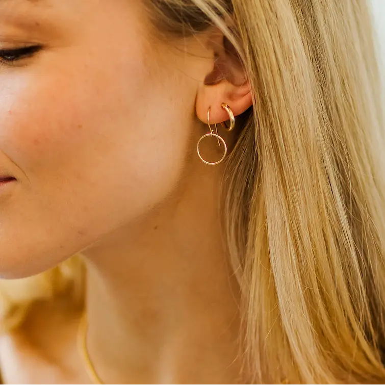 Circle of Love gold hoop earring