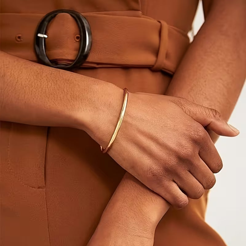 THREE PIECE SET GOLDEN BANGLE BRACELETS