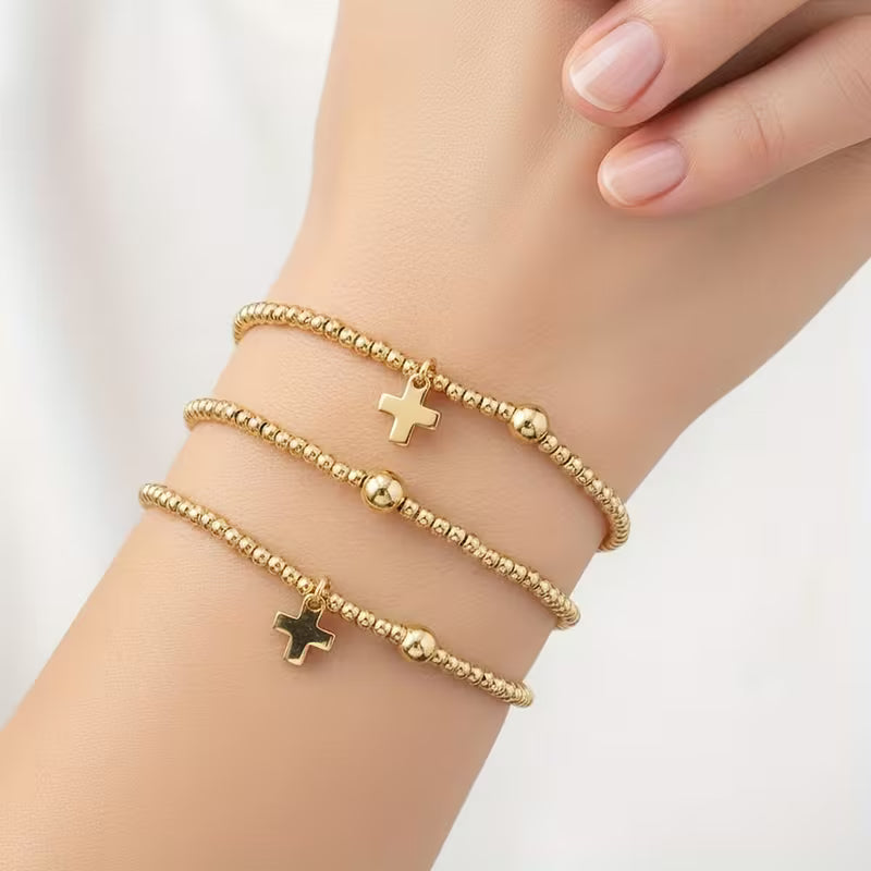 GOLD CROSS BRACELETS - THREE PIECE SET
