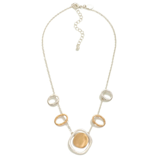 CHAIN LINK NECKLACE FEATURING HAMMERED METAL CIRCLE STATIONS