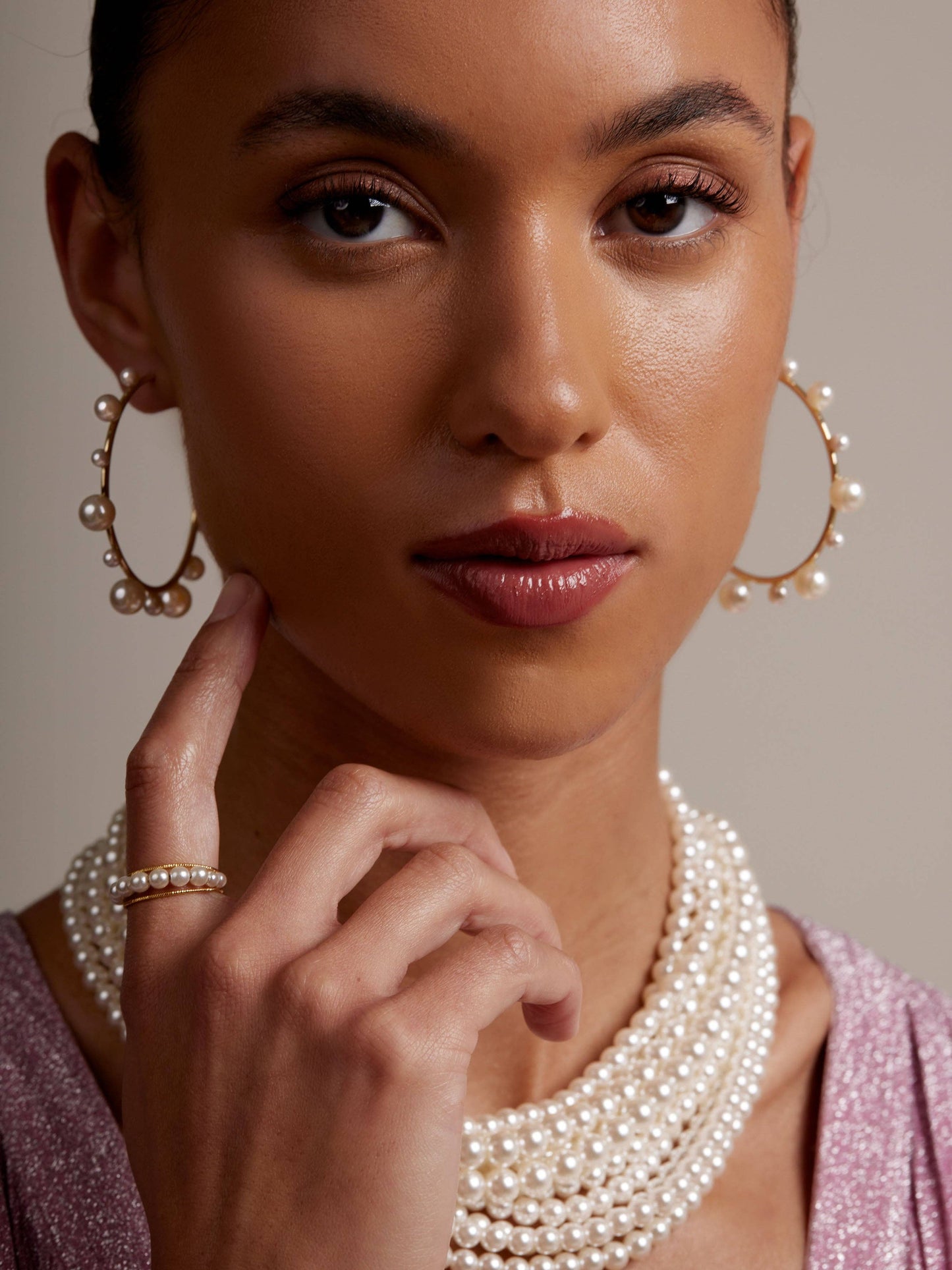 Shiny, gold-tone hoop earring