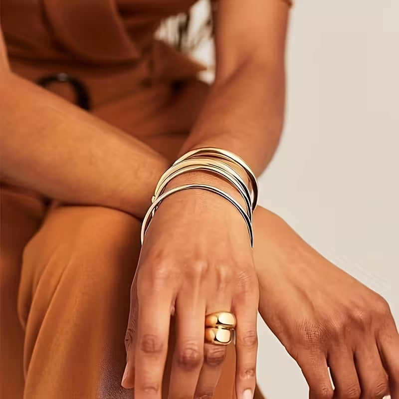 THREE PIECE SET GOLDEN BANGLE BRACELETS