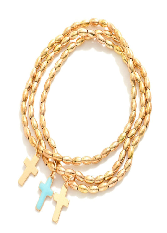Set Of Three Metal Tone Oval Bead Beaded Stretch Bracelets Featuring Enamel Crosses: Aqua