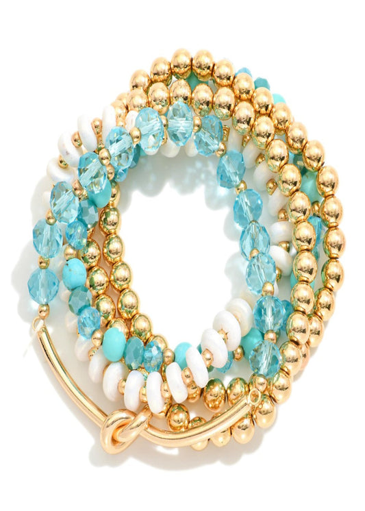 Set of Five Beaded Stretch Bracelets Featuring Glass Beads, Faceted Beads, and Gold Tone Noted Wire Tube Detail: Turquoise