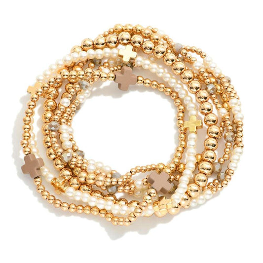 SET OF SEVEN GOLD TONE BEADED BRACELETS - CREAM