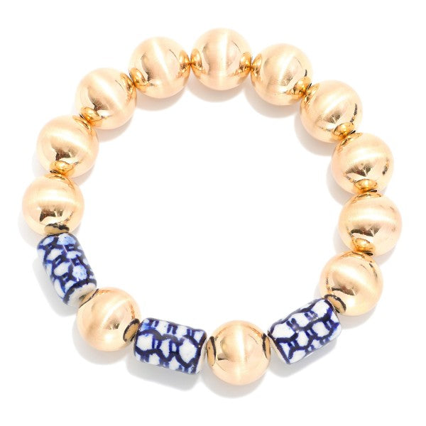 GOLD BRACELET WITH CHINOISERIE BEADS