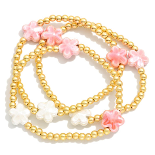 GOLD BRACELET SET OF 3 WITH PINK FLOWERS