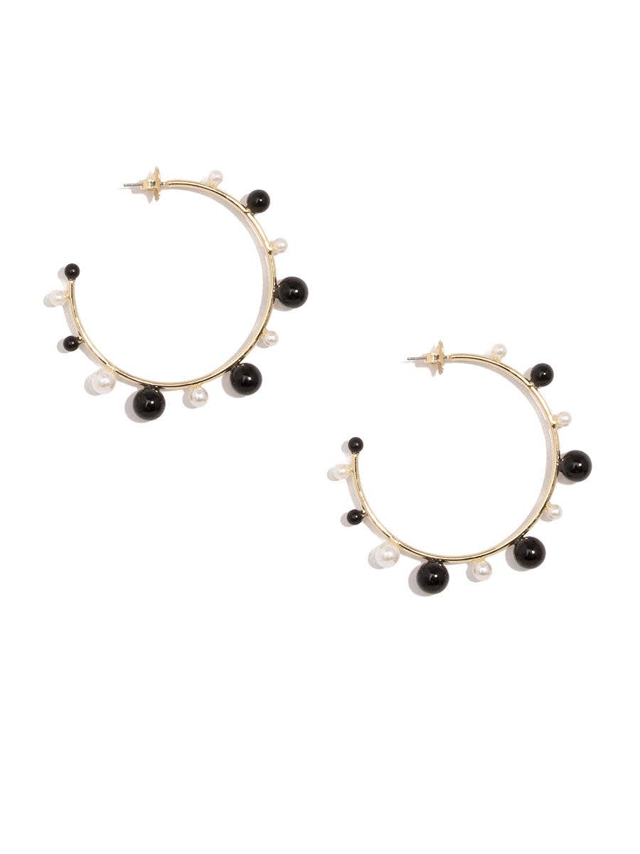 Shiny, gold-tone hoop earring