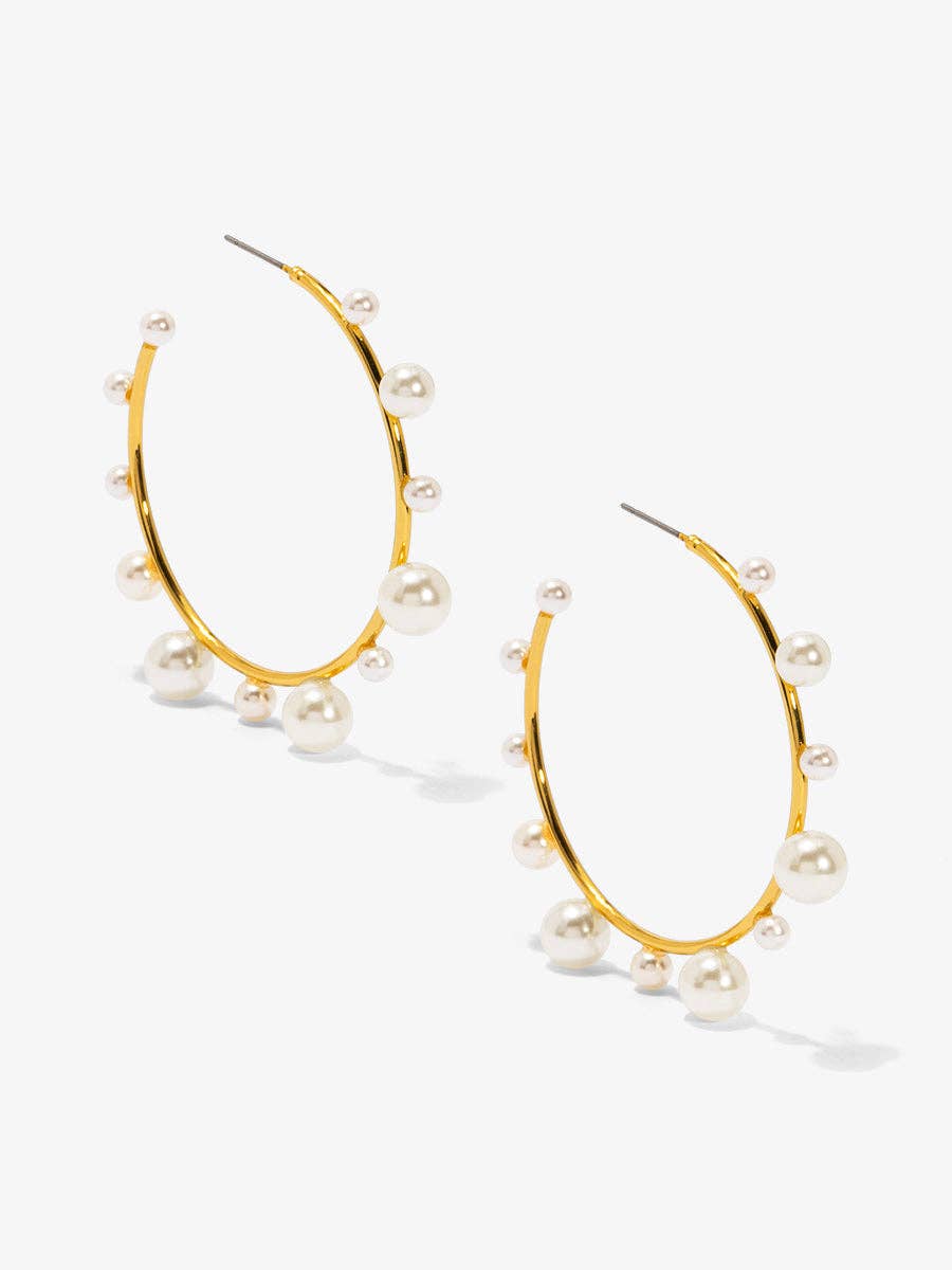 Shiny, gold-tone hoop earring