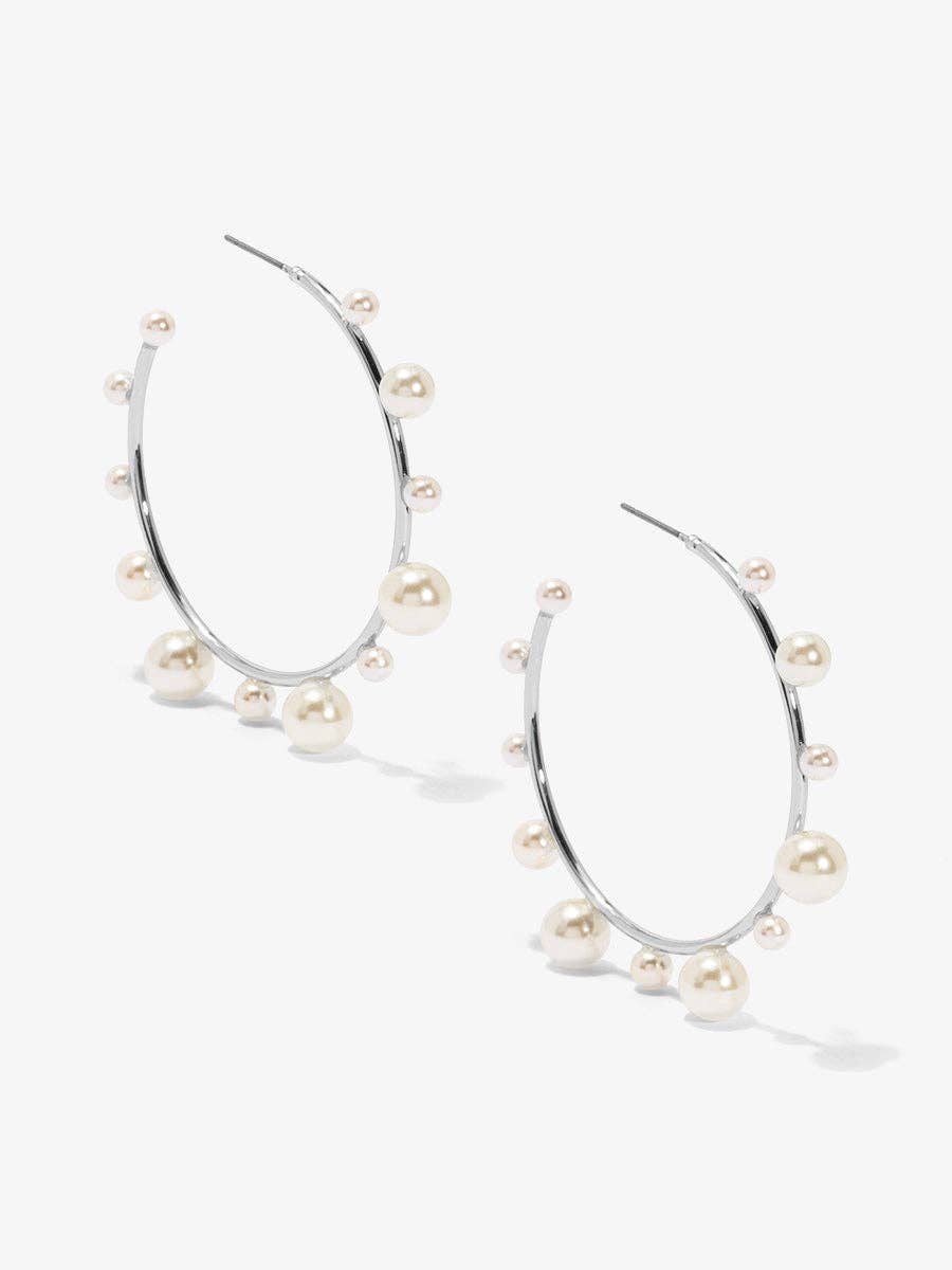 Shiny, gold-tone hoop earring