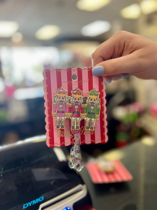 HOLIDAY NUTS BADGE REEL