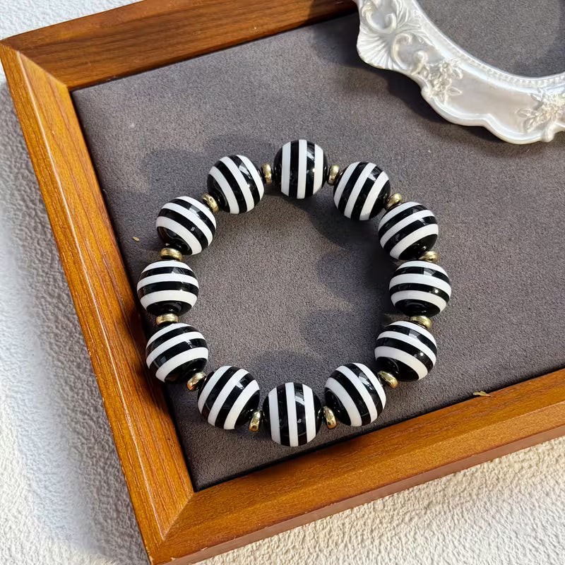 CANDY STRIPED THICK ROUND BRACELET - BLACK