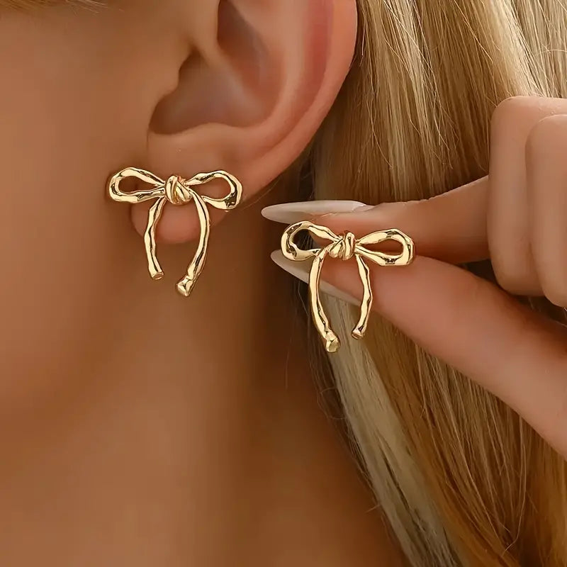 BOW DESIGN STUD EARRINGS