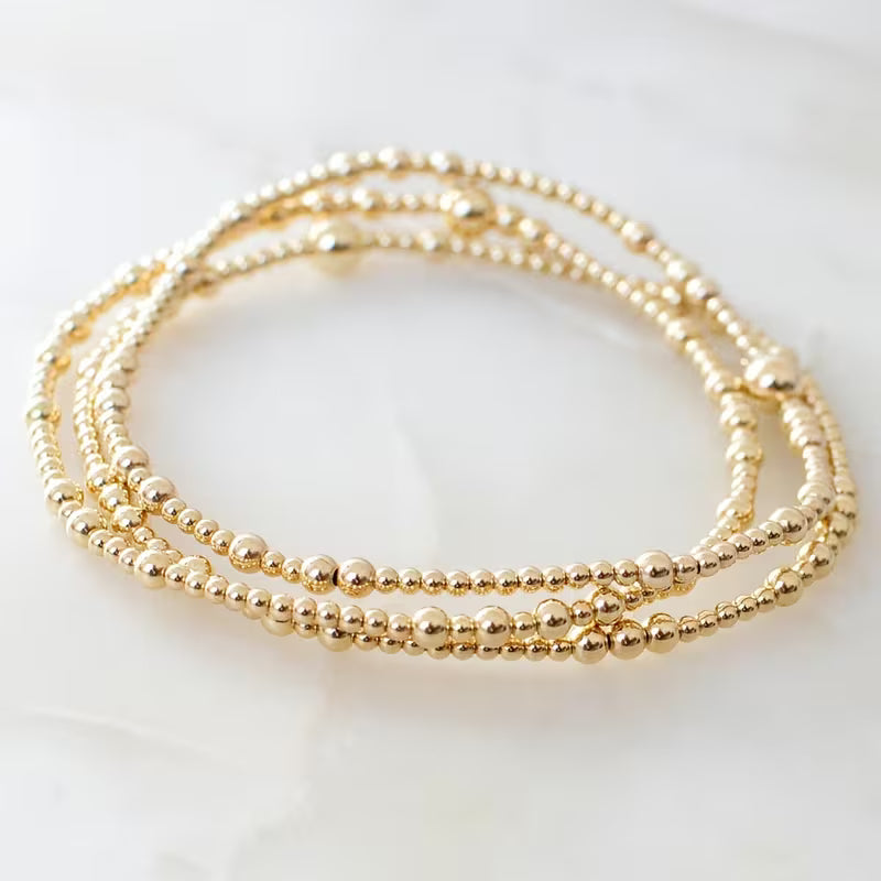GOLD THREE PIECE EUROPEAN BEADED BRACELETS