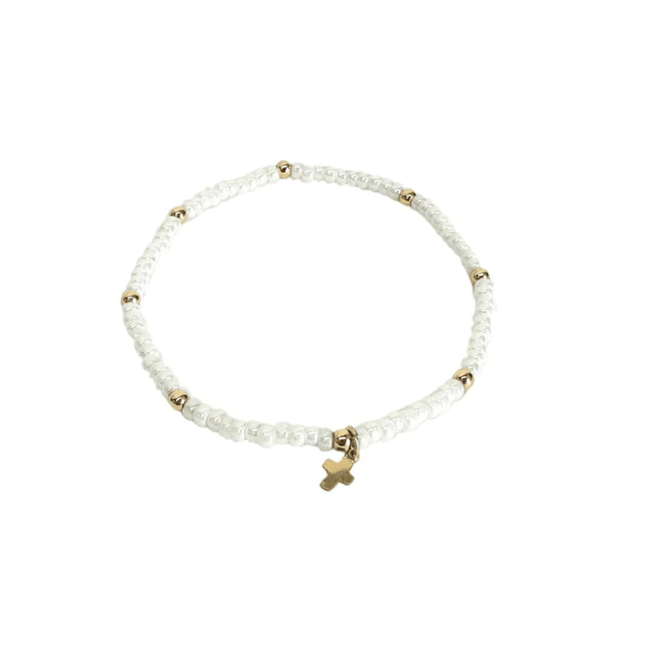 LUXE CROSS BRACELET IN PEARL WHITE